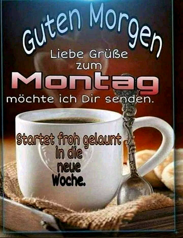 Ein warmes Foto einer weißen Kaffeetasse auf einem rustikalen Holztisch, umgeben von einer rustikalen Serviette und einem Löffel. Im Hintergrund ein paar Kekse. Die Tasse ist mit Kaffee gefüllt. Der Text 'Guten Morgen Liebe Grüße zum Montag möchte ich Dir senden. Startet froh gelaunt in die neue Woche.' ist über und in dem Bild eingeblendet.