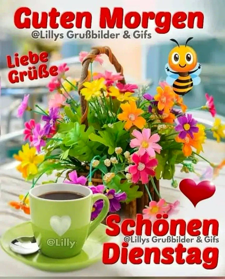 Eine grüne Kaffeetasse mit Herzmotiv und Löffel steht neben einem Korb voller farbenfroher Blüten. Eine niedliche Biene und rote Herzen schmücken das harmonische Bild, das einen schönen Dienstag wünscht.
